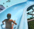Bambino sullo scivolo di Acquafan